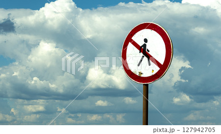 road sign passage is forbidden against the blue sky 127942705