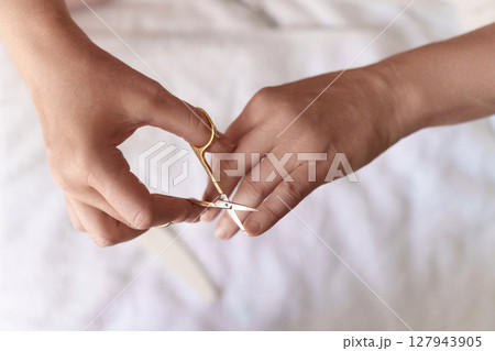 Cutting Fingernails with Manicure Tools Cutting Fingernails with Manicure Tools 127943905