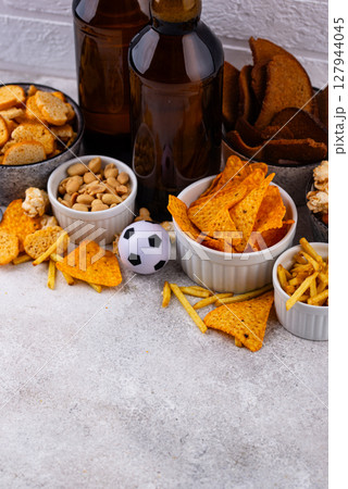 Beer and different snacks for Superbowl or football party Beer and different snacks for Superbowl or football party 127944045