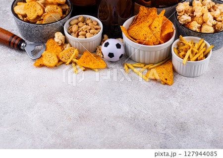 Beer and different snacks for Superbowl or football party 127944085