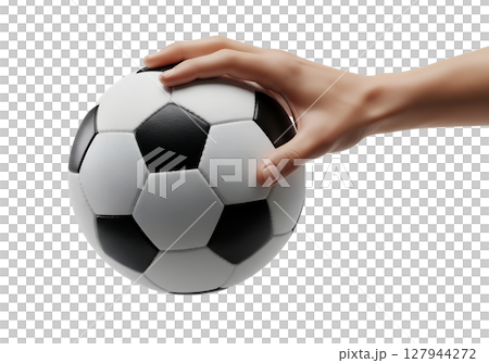 Soccer ball in hand isolated, black and white hexagon pattern, sporty vibe 127944272