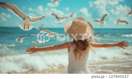 Child welcomes seagulls at the beach during a sunny summer day. AI generated 127945037