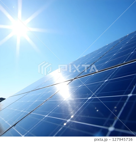solar panels on blue sky and sun. clean energy, eco friendly. alternative energy concept solar panels on blue sky and sun. clean energy, eco friendly. alternative energy concept 127945716