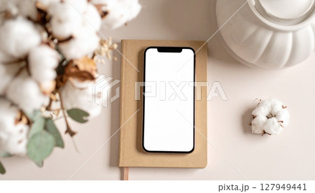 スマホとスケジュール帳のビジネスアイテム 127949441