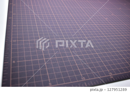 black cutting mat board background with line and scale measure guide pattern for object art design 127951289