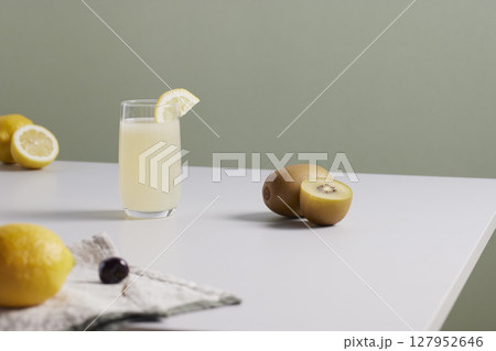 Minimal Aesthetic Beverages in Natural Light with Greenery. Minimal Aesthetic Beverages in Natural Light with Greenery. 127952646