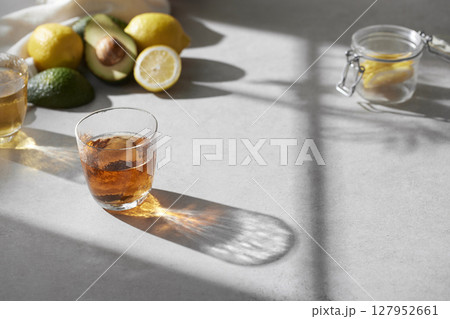 Minimal Aesthetic Beverages in Natural Light with Greenery. Minimal Aesthetic Beverages in Natural Light with Greenery. 127952661