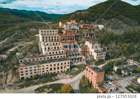 Aerial view of an abandoned mining and processing plant in a mountainous region Aerial view of an abandoned mining and processing plant in a mountainous region 127953028