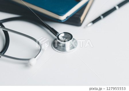 Concept business education essential idea globalization, student learn and study in university and colleges to master knowledge needed travel global economy. book stethoscope for medical health care Concept business education essential idea globalization, student learn and study in university and colleges to master knowledge needed travel global economy. book stethoscope for medical health care 127955553