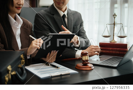 Business and Male lawyer or judge consult having team meeting with client, Law and Legal services concept.Customer service good cooperation in office 127956335