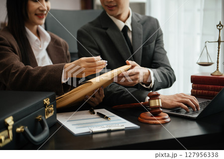 Business and Male lawyer or judge consult having team meeting with client, Law and Legal services concept.Customer service good cooperation in office 127956338