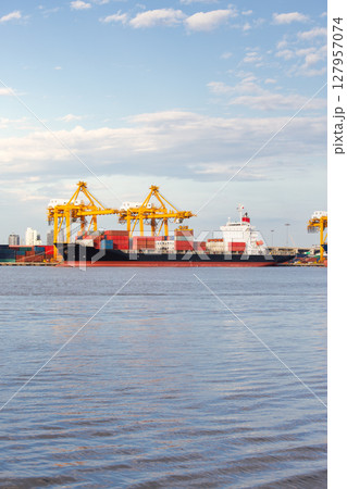 Cargo ship at port in Bangkok city, Thailand. Cargo ship at port in Bangkok city, Thailand. 127957074