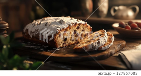 Delicious fruit bread on a rustic wooden table with a cozy atmosphere 127957085