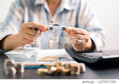 Concept businessman vehicle finance protection office plan investment protect hand save buy sell car ensuring idea financial security automobile agent purchase insurance secure favorable loan deal 127957183