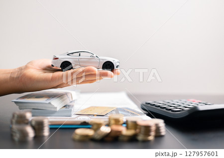 Concept businessman vehicle finance protection office plan investment protect hand save buy sell car ensuring idea financial security automobile agent purchase insurance secure favorable loan deal 127957601