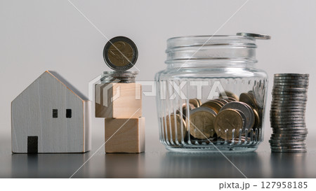 Business home concept involves strategic financial management money coin save bank real estate economic loan investment development growth encourage accountancy buy income stack investment economy 127958185
