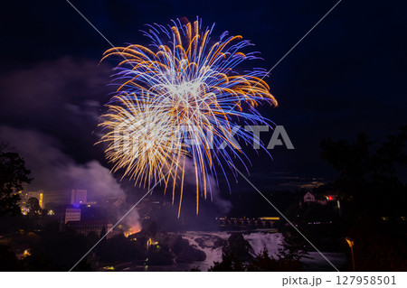 Fantastic fireworks at the Rhine Falls during the Swiss National Day celebrations on August 1 in Neuhausen am Rheinfall, Schaffhausen canton, Switzerland Fantastic fireworks at the Rhine Falls during the Swiss National Day celebrations on August 1 in Neuhausen am Rheinfall, Schaffhausen canton, Switzerland 127958501