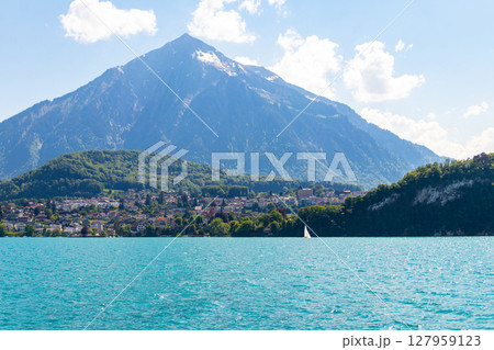 View of the Lake Thun and Niesen mountain (so called Swiss Pyramid) in Switzerland 127959123