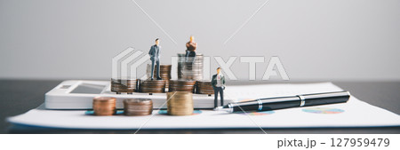 Financial calculate accountant blur background close up on calculator with graph chart banner bank office desk. Finance Concept tax banking money expense accounting budget businessman use calculator. Financial calculate accountant blur background close up on calculator with graph chart banner bank office desk. Finance Concept tax banking money expense accounting budget businessman use calculator. 127959479