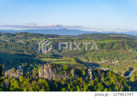 Stunning panorama from Pantheon Lookout showcases lush landscapes of Bohemian Paradise with the majestic Krkonose Mountains in the background. A perfect spot for nature lovers and hikers. 127961347