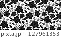 Seamless floral pattern with black silhouettes of flowers on a white background. Ideal for fabric prints, wallpapers, gift wrap, stationery, textile, and spring or summer-themed designs. 127961353