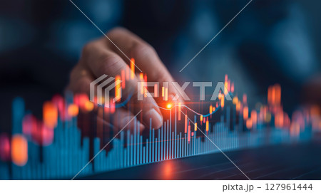 Investor analyzing financial chart trends and data 127961444