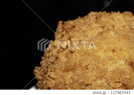 Crispy Scotch Egg Batter Fried Golden Close up with runny yolk Crispy Scotch Egg Batter Fried Golden Close up with runny yolk 127963541