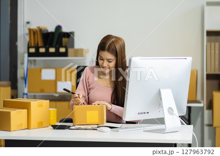 online shopping concept, woman shopping online is a form of electronic commerce from a seller over internet. 127963792
