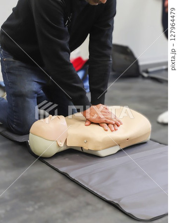 first aid course. Heimlich maneuver. company safety. cardiac massage. Basic Life Support	 127964479