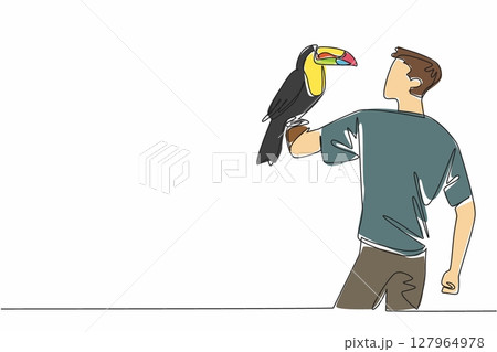 Single one line drawing keel billed toucan perched on hand of man. This species is found in tropical forests. Eat insects or fruit. Pets. Man Holding Bird. Continuous line design graphic illustration Single one line drawing keel billed toucan perched on hand of man. This species is found in tropical forests. Eat insects or fruit. Pets. Man Holding Bird. Continuous line design graphic illustration 127964978