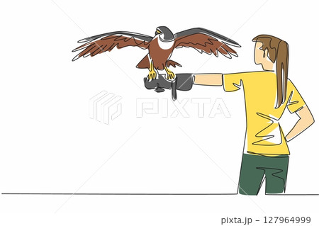 Single one line drawing peregrine falcon perched on hand of woman. The fastest animal in the world while chasing its prey. Strong claws. Woman Holding Bird. Continuous line design graphic illustration 127964999
