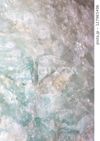 Close up of spiritual holistic crystal grain and rock for background 127965496