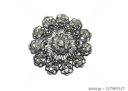 Vintage Antique Silver Diamond Jewel Brooch on White Background Vintage Antique Silver Diamond Jewel Brooch on White Background 127965527