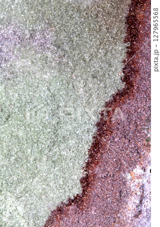 Close up of spiritual holistic crystal grain and rock for background 127965568