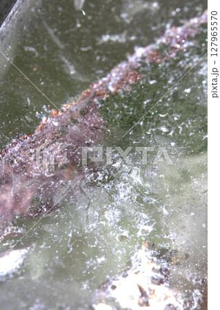 Close up of spiritual holistic crystal grain and rock for background Close up of spiritual holistic crystal grain and rock for background 127965570