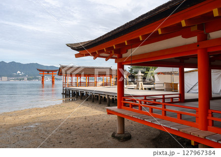 Itsukushima Shrine and iconic torii gate on Miyajima island, Japan 127967384