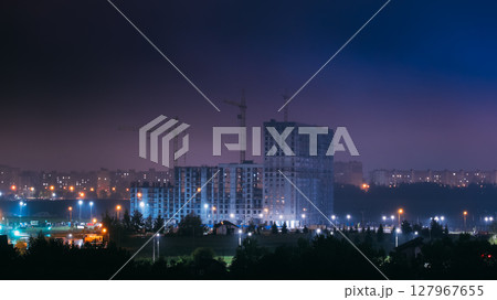Night City Illumination. Development Urban Skyline In Evening. Development Residential Building. Smog Over City. blue sky 127967655