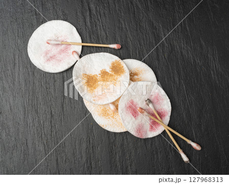 Dirty Cotton Pads and Swabs, Makeup Removal, Used Cotton Disks after Makeup Cleansing 127968313