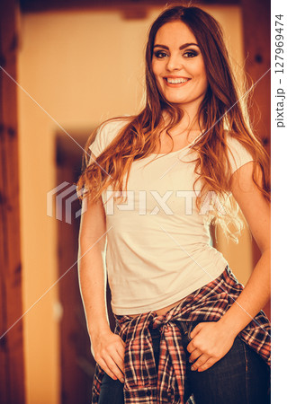 Happy cute pretty young woman girl at home. Happy cute pretty young woman girl at home. 127969474