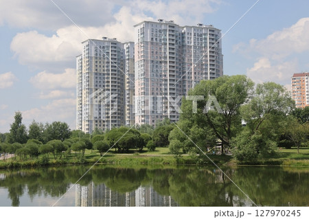 Summer sunset view of Yuzhnoe Butovo park in South Butovo district, Moscow, Russia. 127970245
