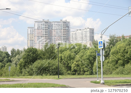 Summer sunset view of Yuzhnoe Butovo park in South Butovo district, Moscow, Russia. Summer sunset view of Yuzhnoe Butovo park in South Butovo district, Moscow, Russia. 127970250