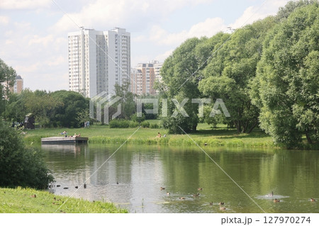 Summer sunset view of Yuzhnoe Butovo park in South Butovo district, Moscow, Russia. 127970274