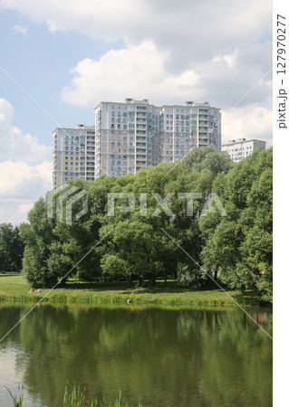 Summer sunset view of Yuzhnoe Butovo park in South Butovo district, Moscow, Russia. 127970277