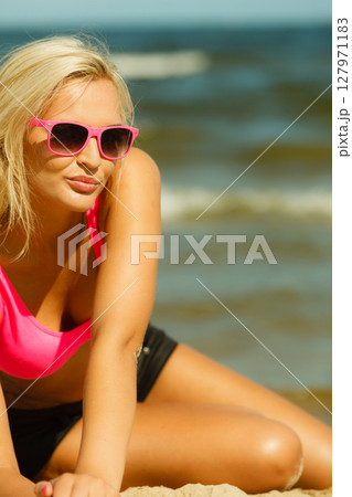 Young girl on beach. Young girl on beach. 127971183
