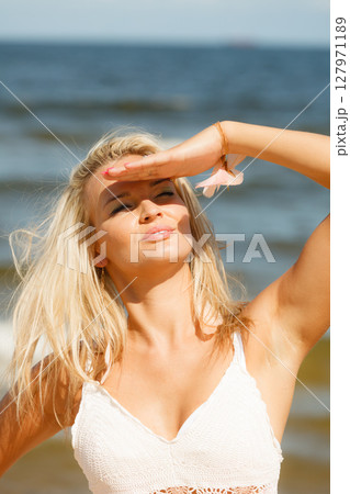 Pretty girl on beach. Pretty girl on beach. 127971189