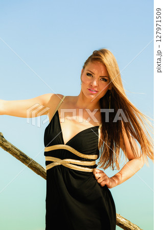 Happy woman outdoor on beach. Happy woman outdoor on beach. 127971509