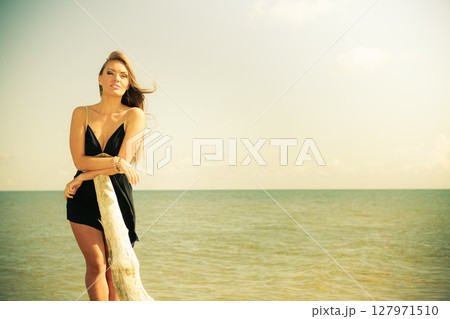Beautiful sexy girl on seashore Beautiful sexy girl on seashore 127971510
