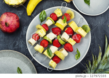 Fruit kebabs, summer snack. Fruit kebabs, summer snack. 127972103