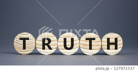 Truth symbol. Concept word Truth on beautiful wooden circles. Beautiful grey table grey background. Business lifestyle truth concept. Copy space. 127972337