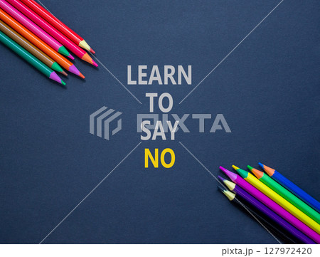 Learn to say no symbol. Concept words phrase Learn to say no on beautiful black paper. Colored pencils. Beautiful black paper background. Business psychological Learn to say no concept. Copy space. Learn to say no symbol. Concept words phrase Learn to say no on beautiful black paper. Colored pencils. Beautiful black paper background. Business psychological Learn to say no concept. Copy space. 127972420